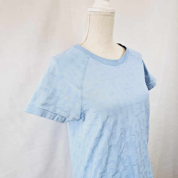 Athleta Allover Graphic Seamless Running Tee size Large - Picture 3 of 8